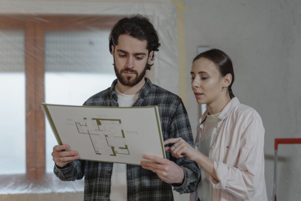 Bathroom Remodel Contractors: 7 Best Secrets to Hire Pros bathroom remodel contractors reviewing plans